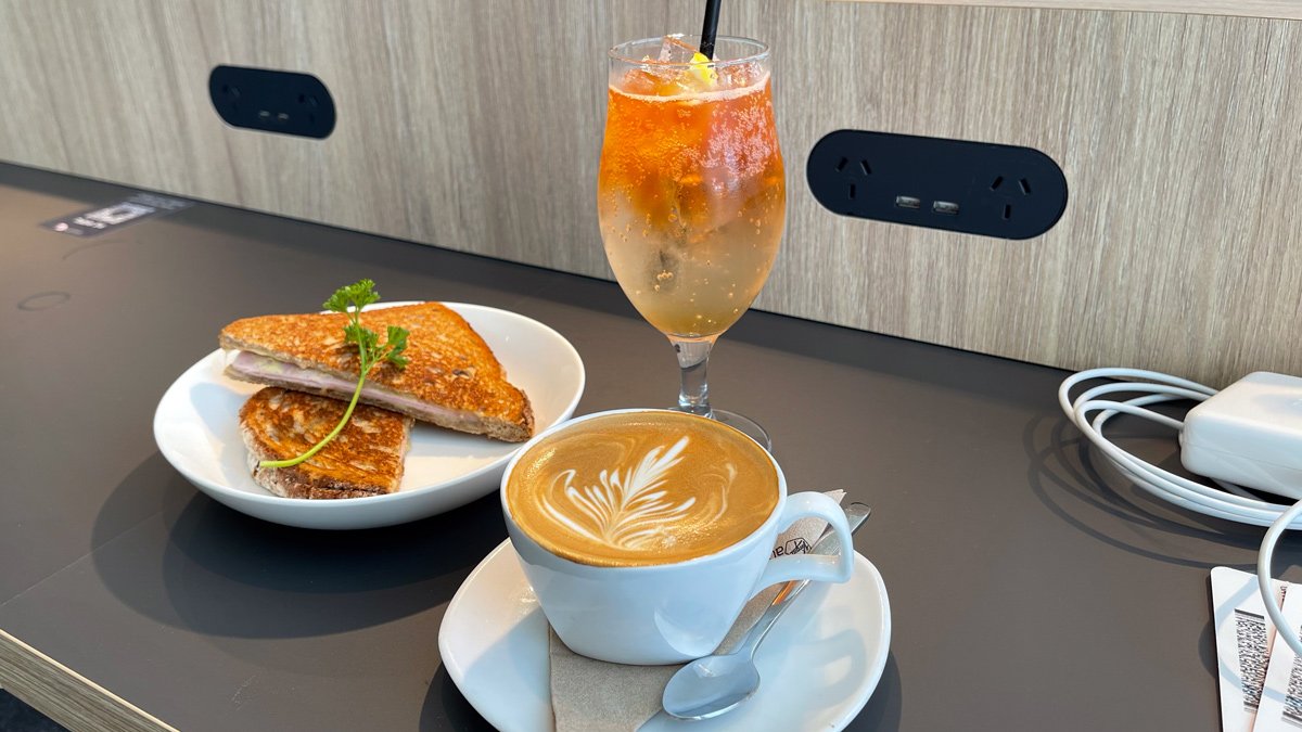 a plate of food and a drink on a table