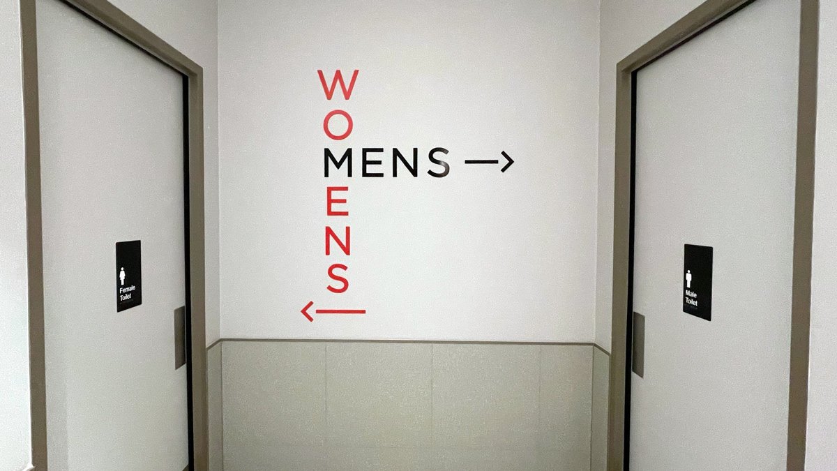 a bathroom with two doors