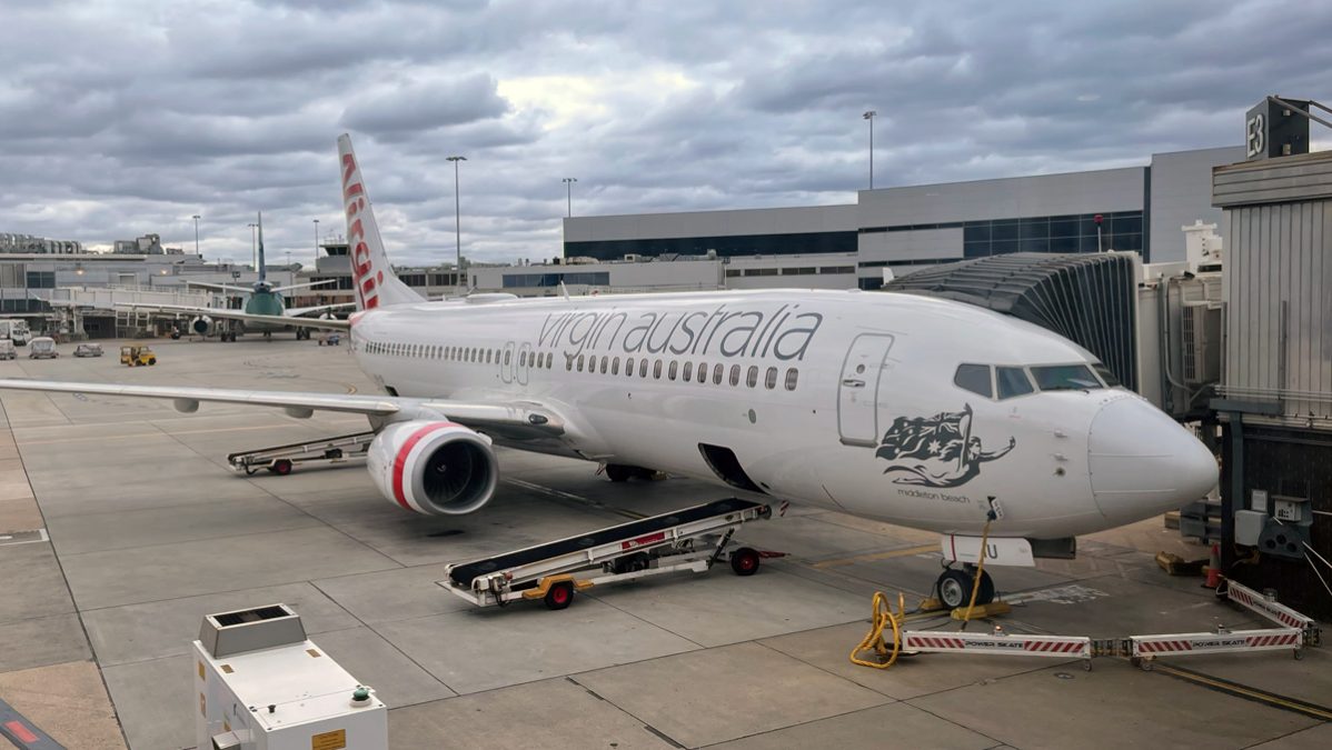 a large white airplane at an airport