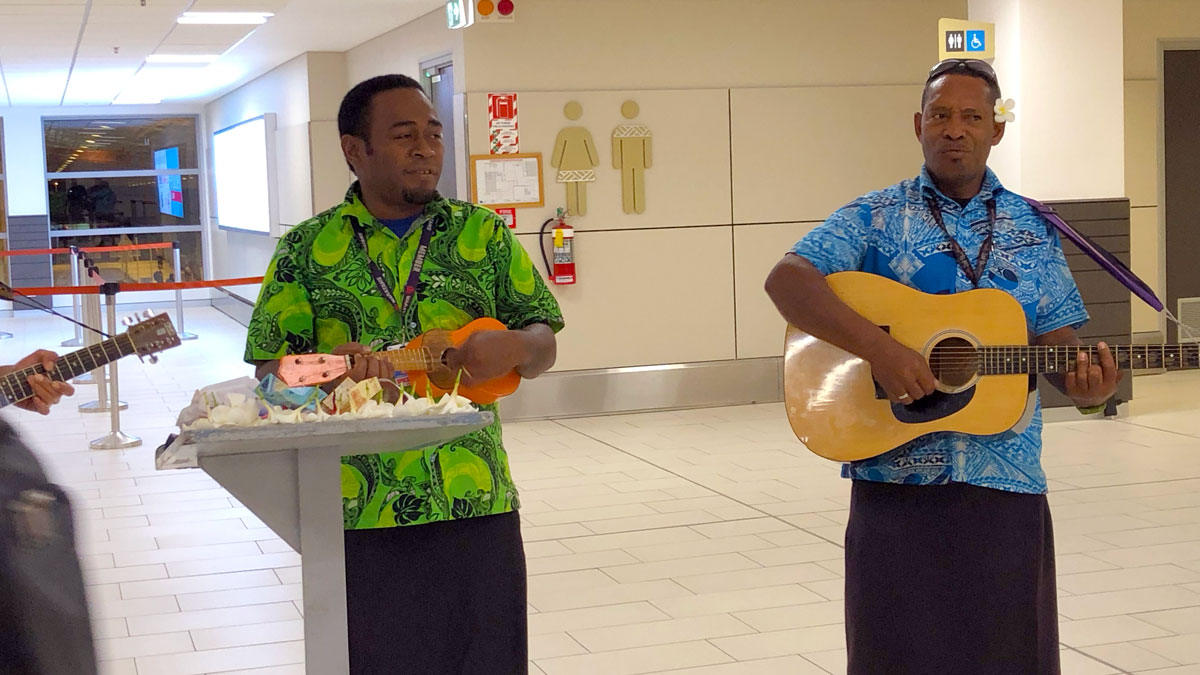 a group of men playing guitars