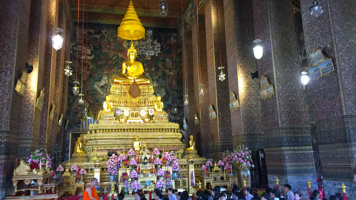 a group of people in a temple