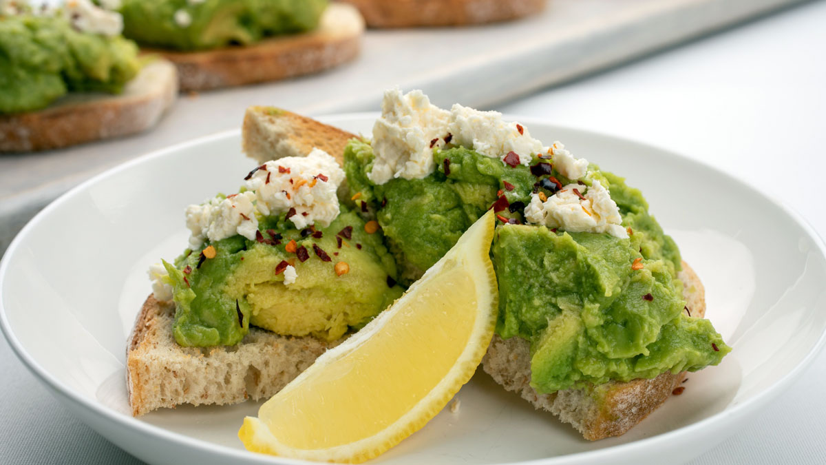 a plate of food with a slice of lemon