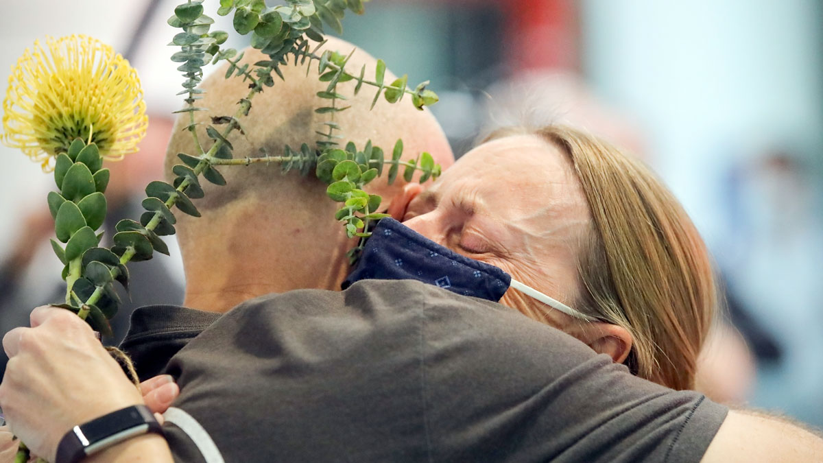 a man and woman hugging