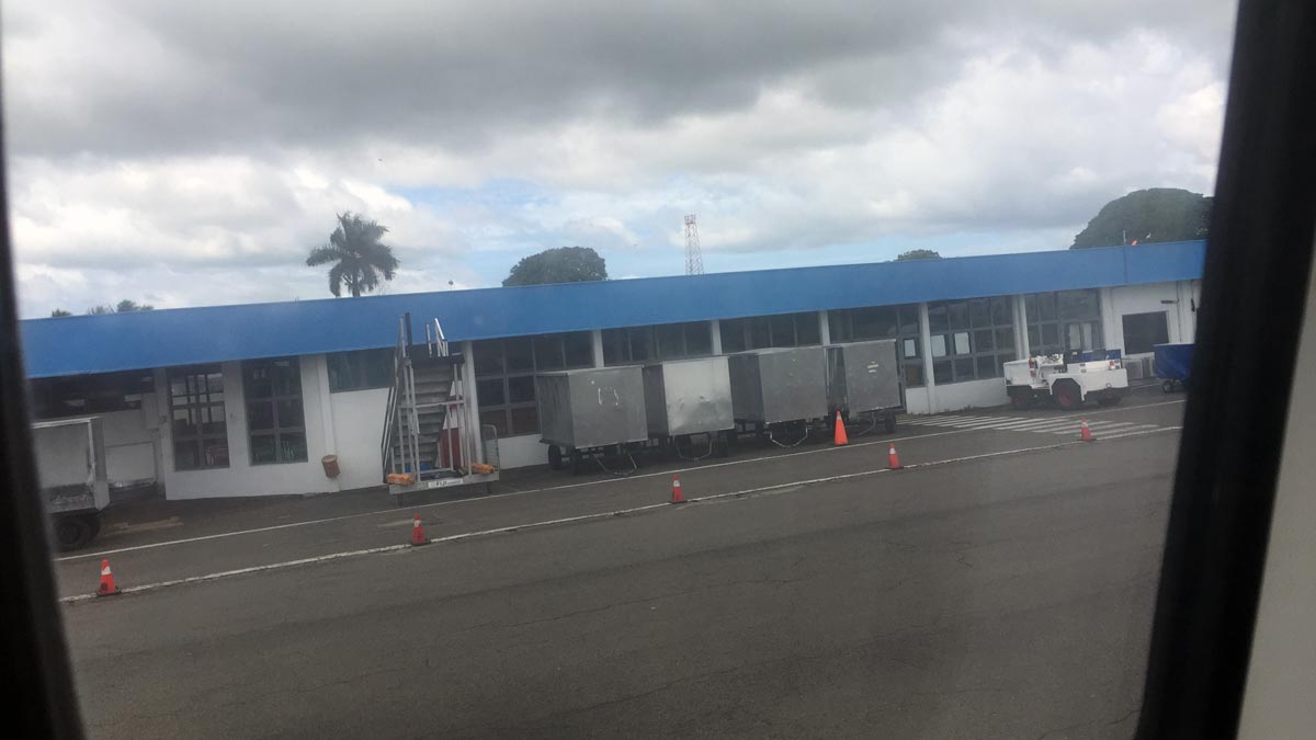 a building with a blue roof and a blue roof