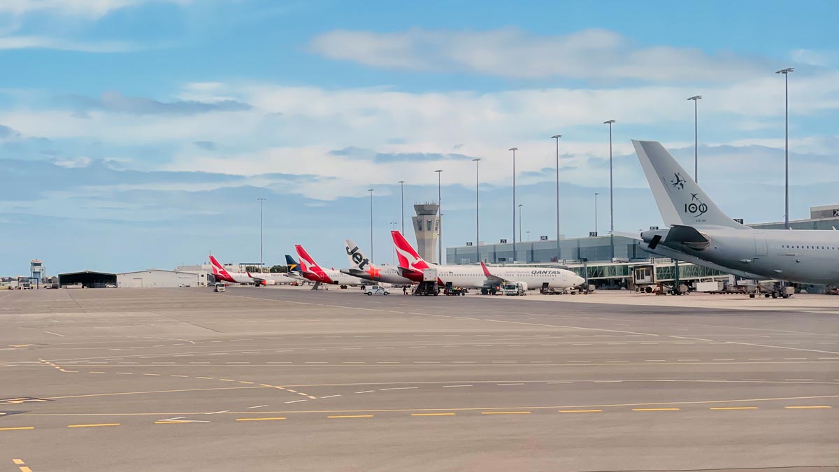 airplanes parked on a runway