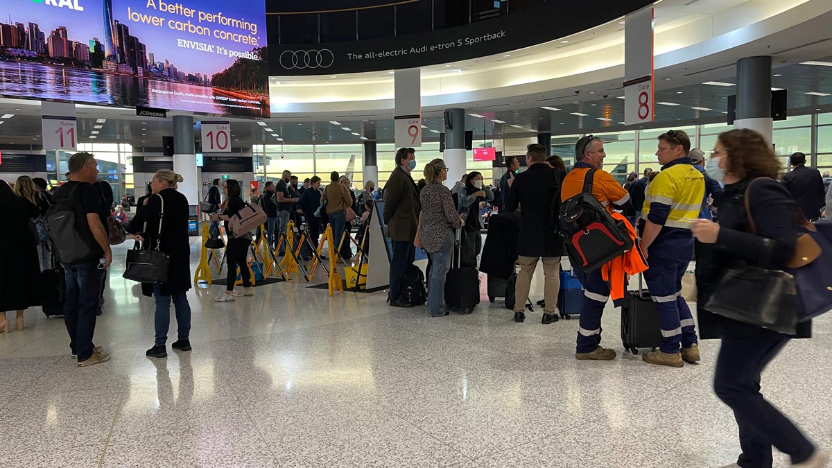 a group of people in a terminal