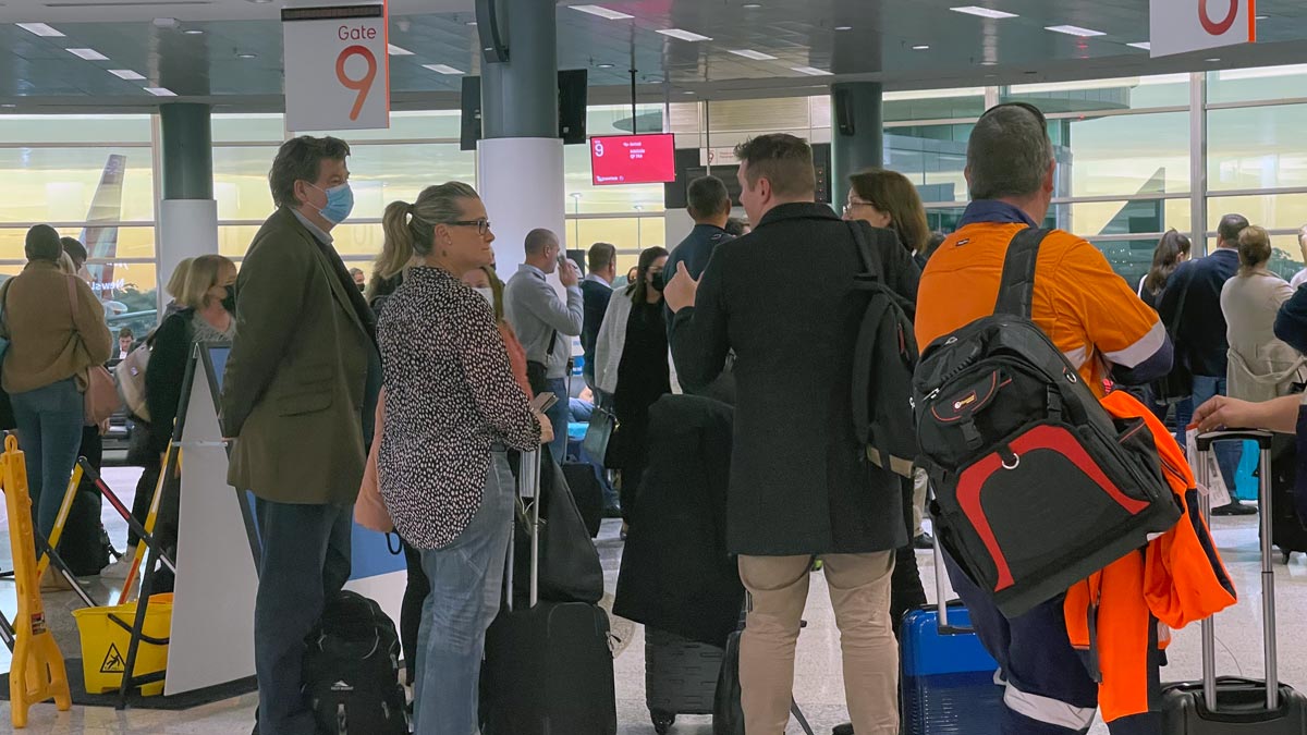 a group of people in a terminal