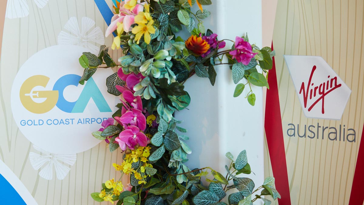 a group of flowers on a wall