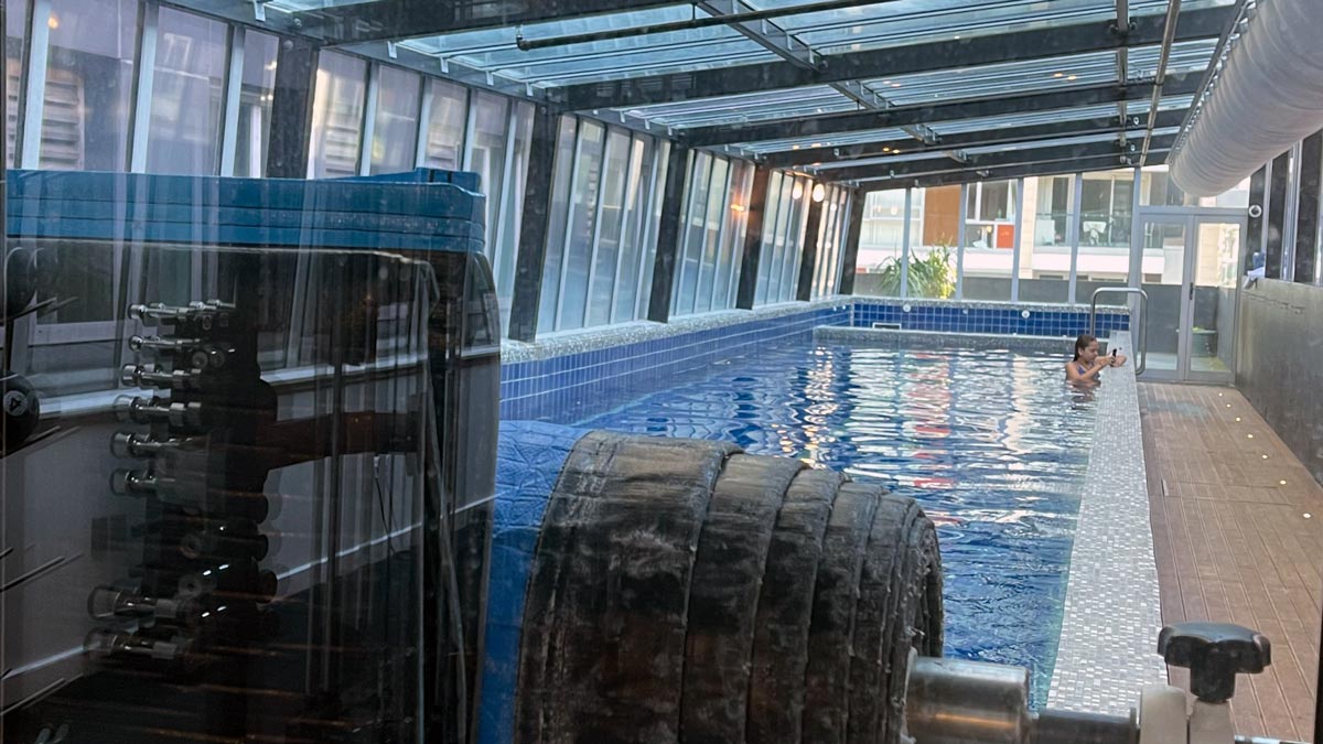 a pool with large tires in it