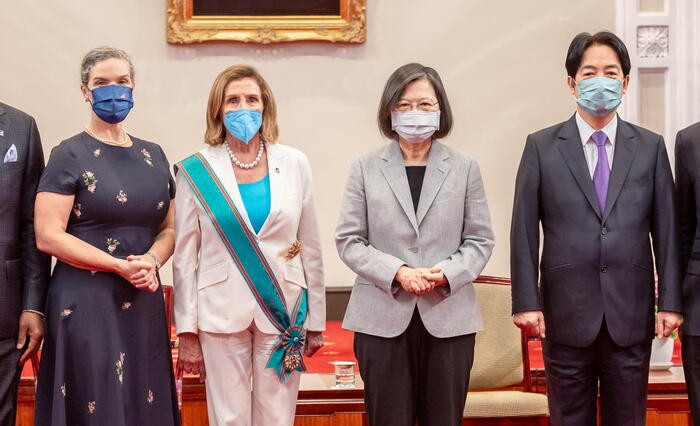 a group of people wearing masks