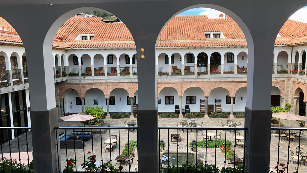 a view of a courtyard from a balcony