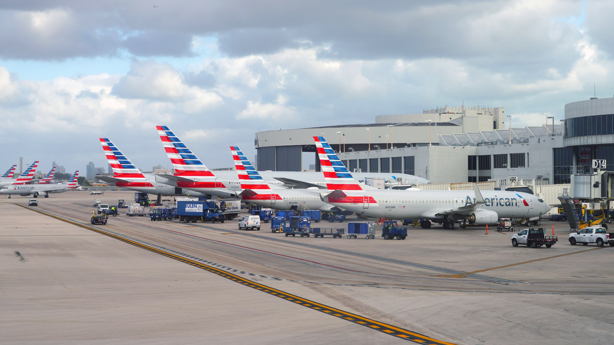 airplanes parked at an airport