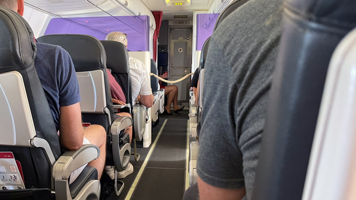 Virgin Australia's old interior with business Class bulkhead and magnetic bar
