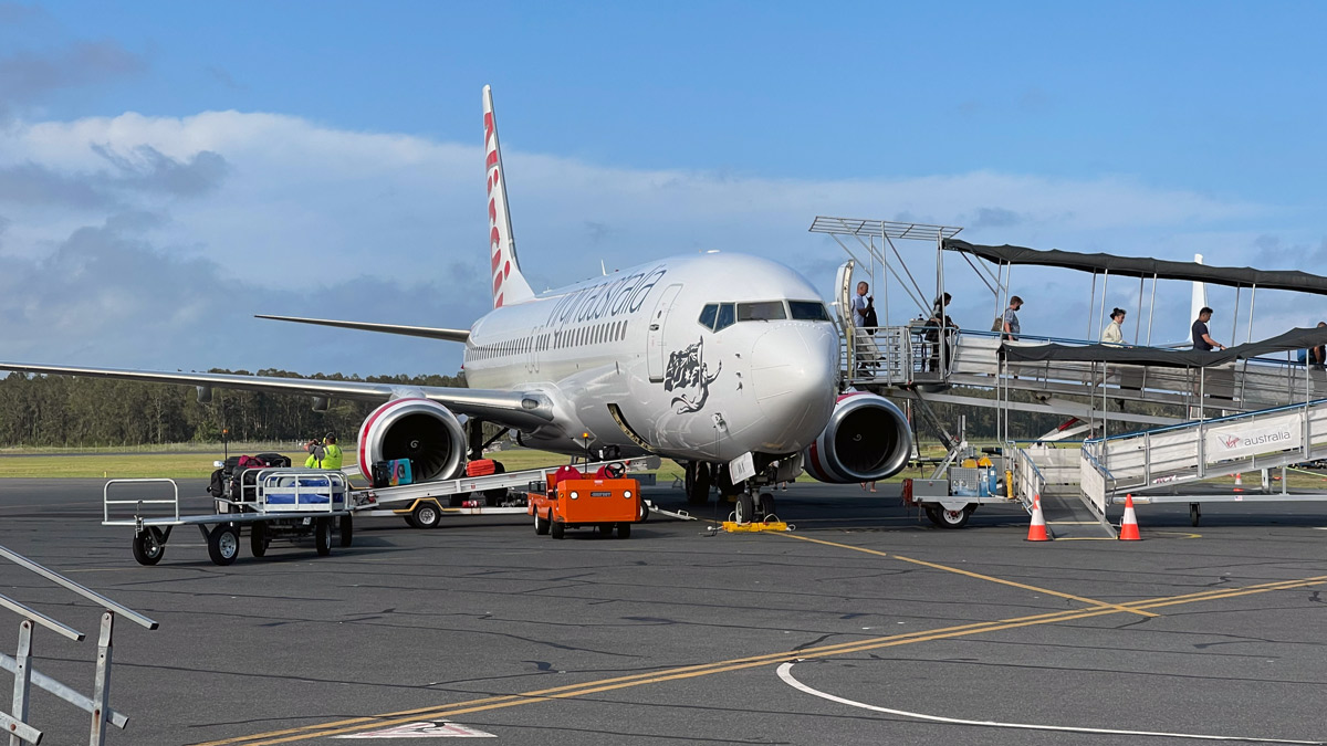 a white airplane on a tarmac