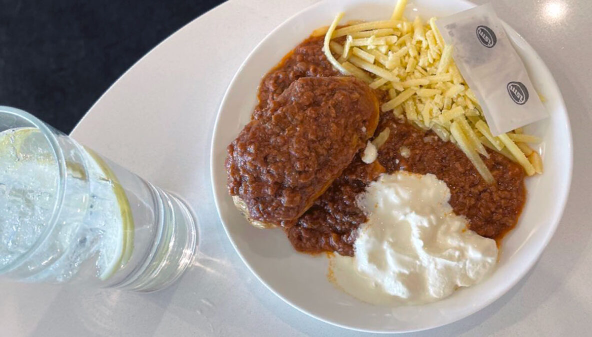 a plate of food and a glass of water