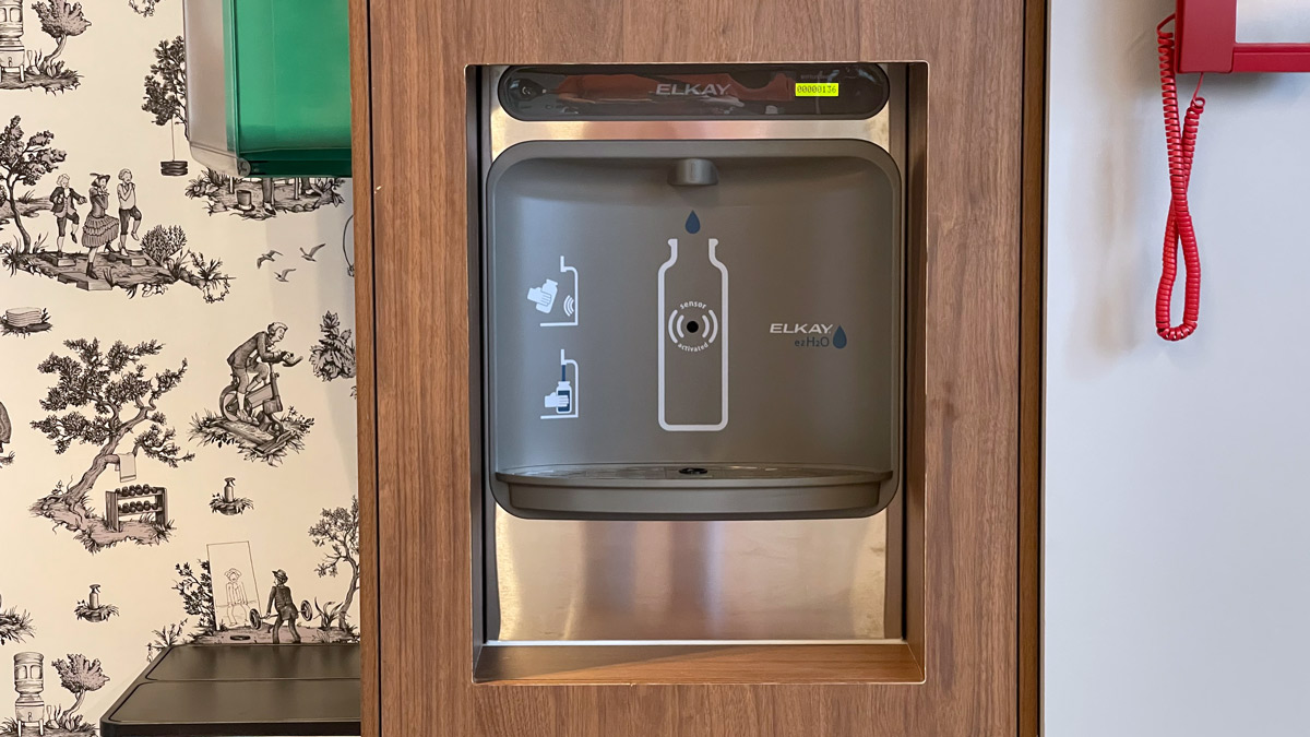 a water dispenser with a bottle in it