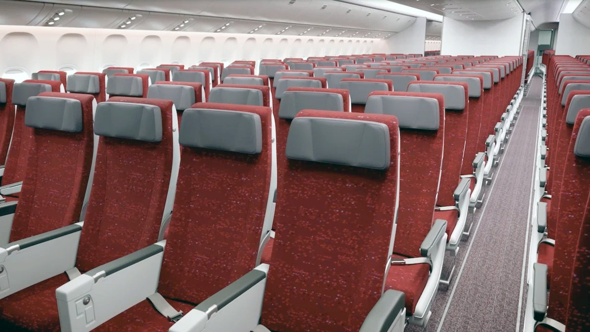 a row of red and grey seats