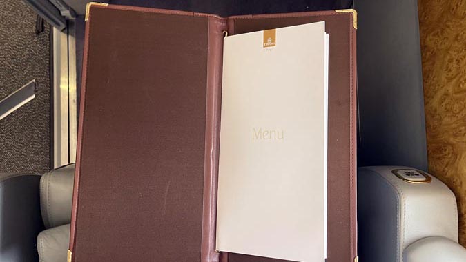 a menu in a leather case