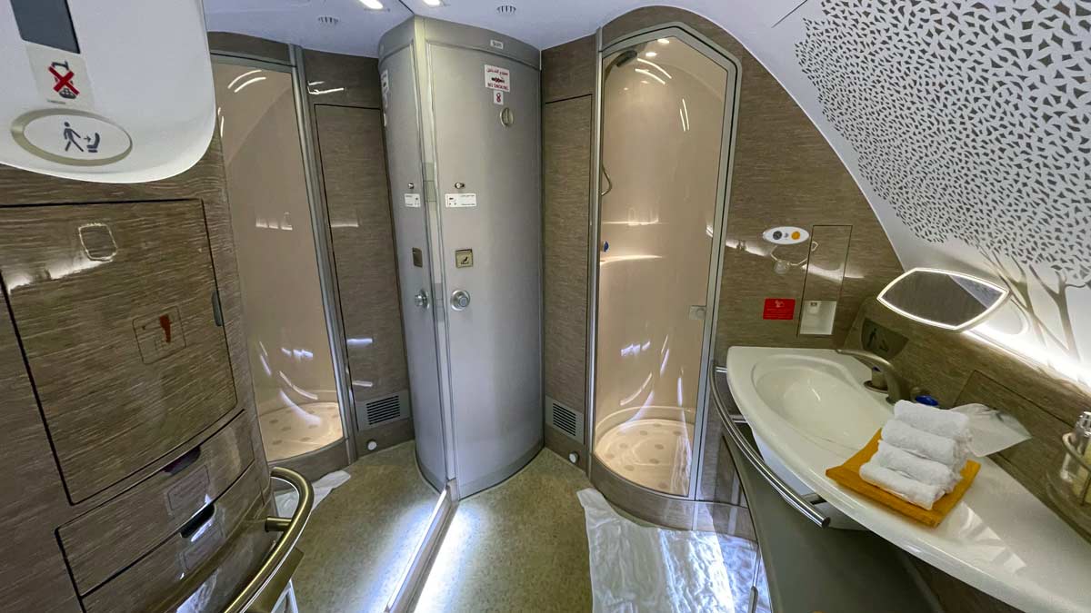 a bathroom with a shower and sink