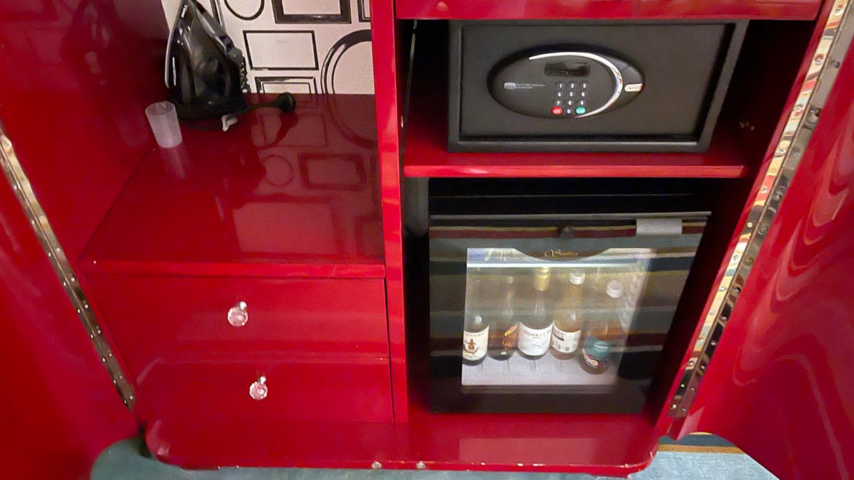 Armoire housing minibar, safe, wardrobe drawers and snack station. Hotel DeBrett, Auckland, New Zealand [Schuetz/2PAXfly]