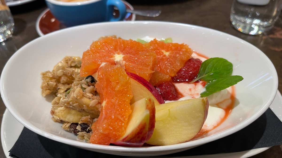 a bowl of fruit and yogurt