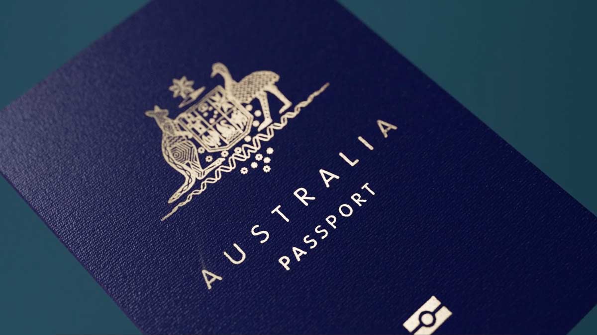 a blue passport with a kangaroo and coat of arms
