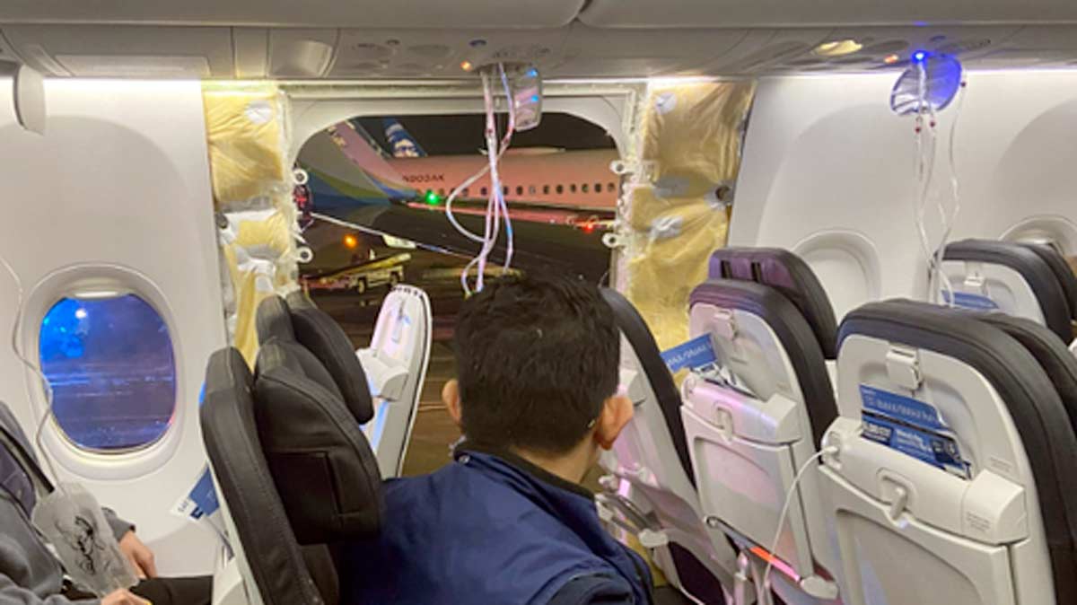 a man sitting in an airplane