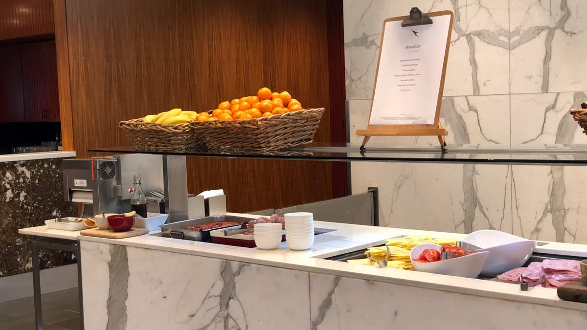 a buffet with fruit in baskets