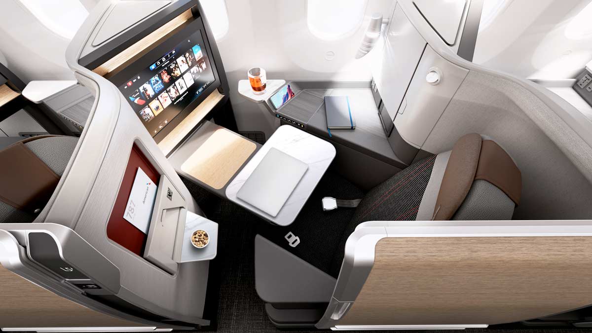 a table and a tv in a plane
