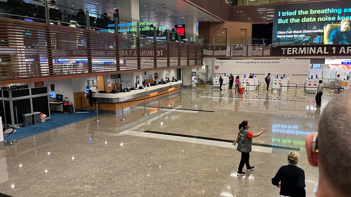 people walking in a large hall