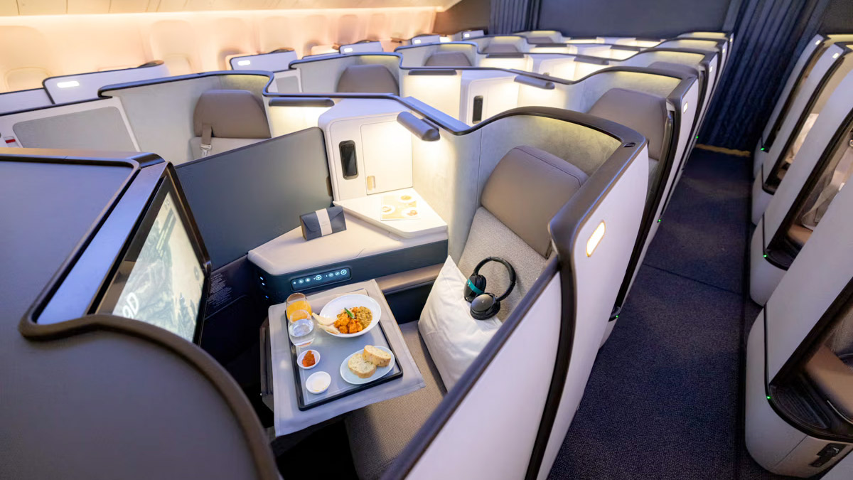 a tray of food on a table in a plane