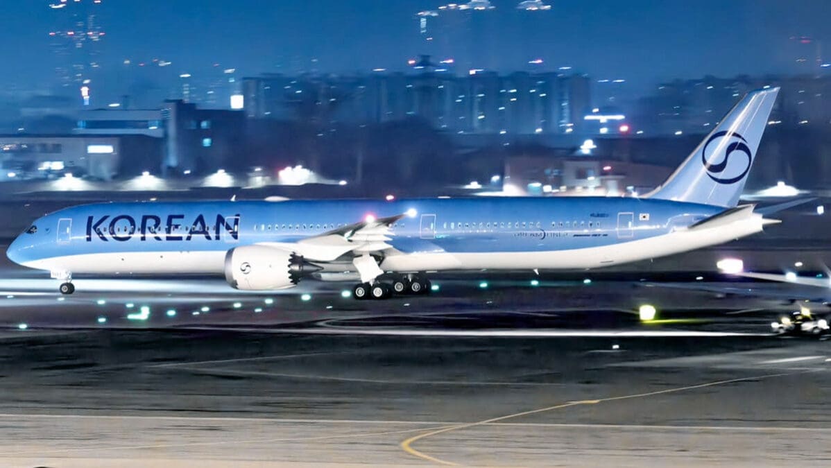 a plane taking off at night