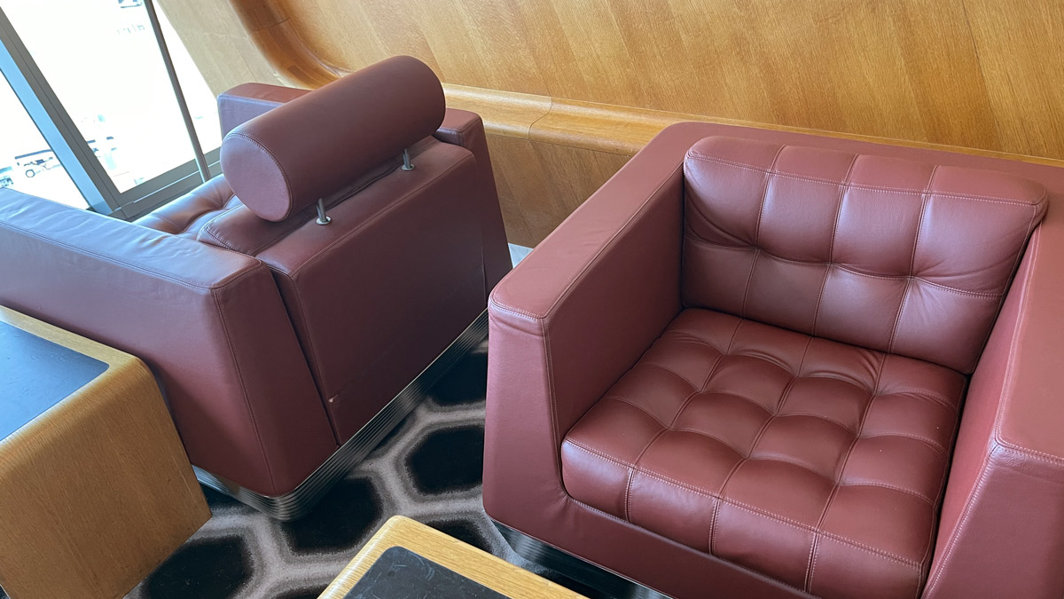 a red leather couches in a room
