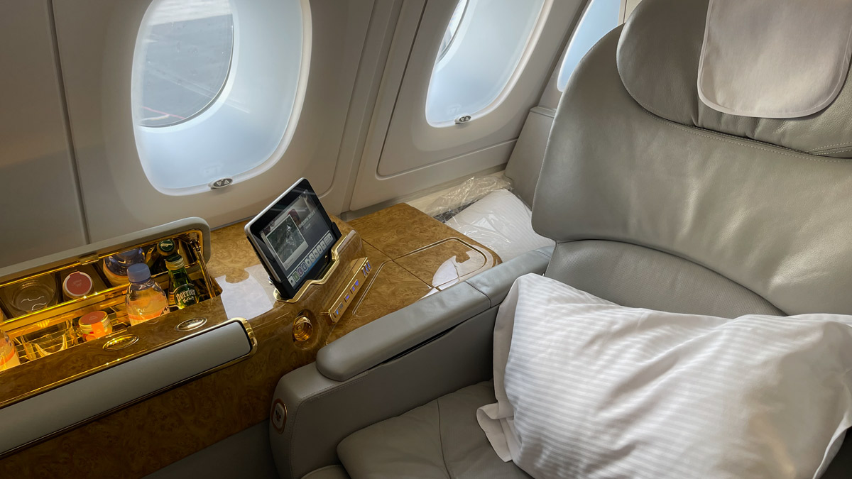 a seat with a screen on the side of it