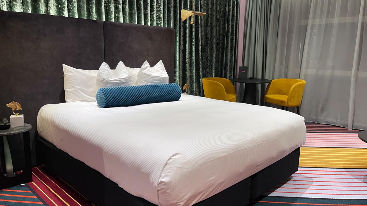 a bed with a pillow on it
