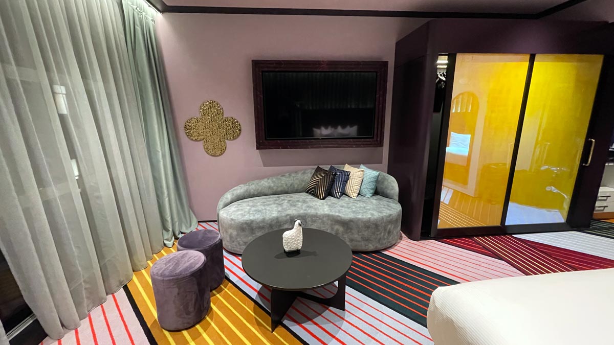 a room with a couch and a tv