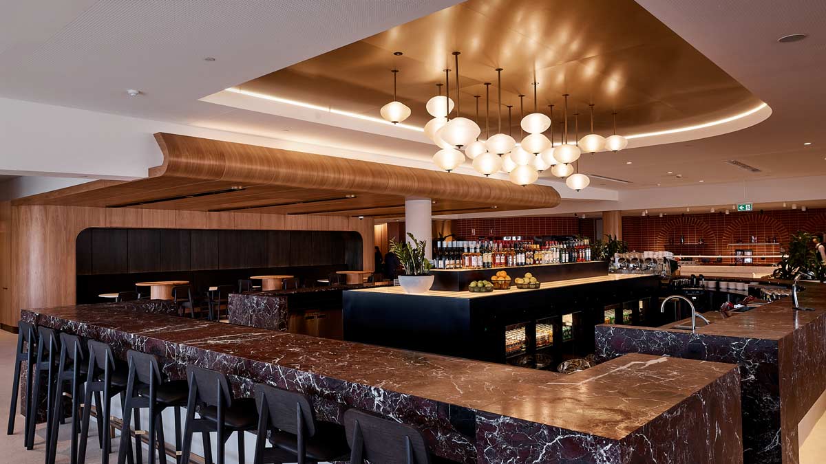 a bar with lights from the ceiling