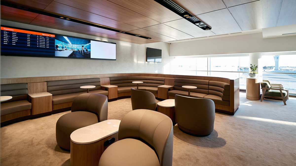 a room with a couch and tables