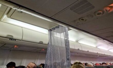 VIRGIN AUSTRALIA: Weird Business Class shower curtain divider reported.