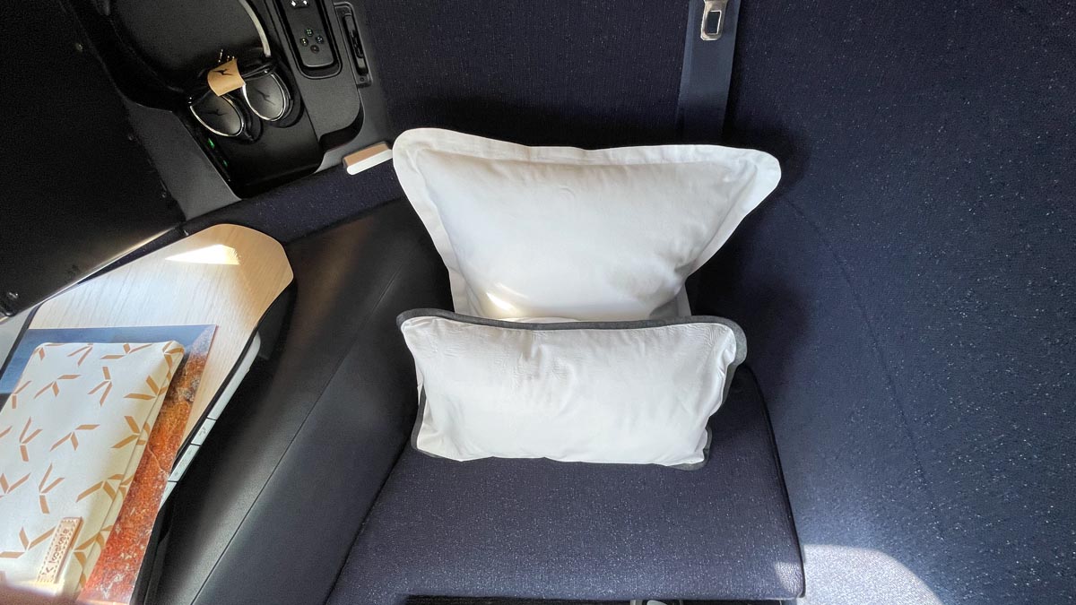a white pillows on a seat