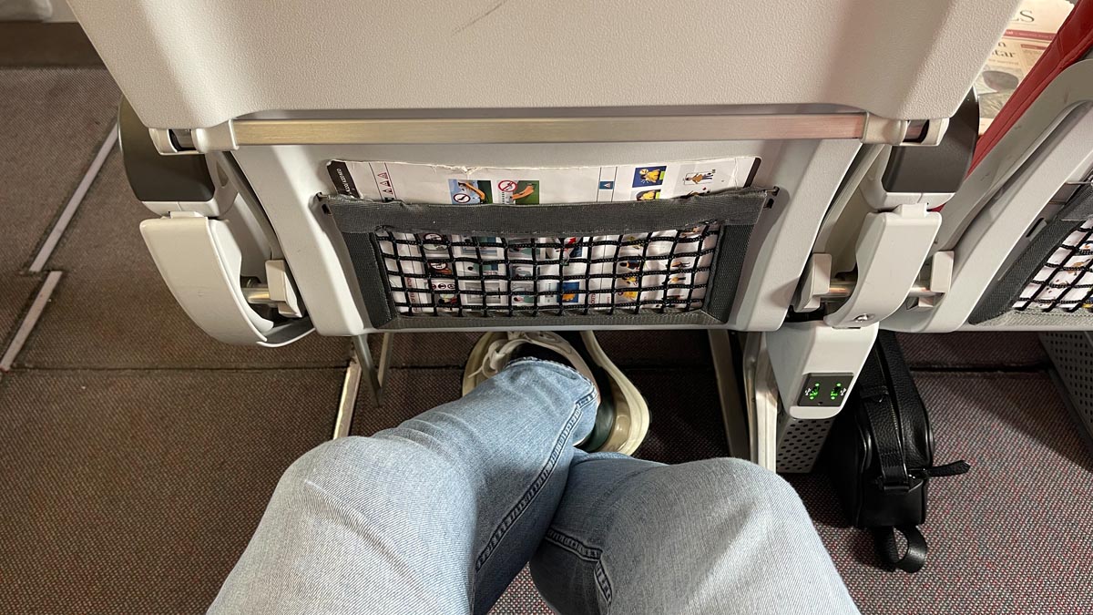 a person's legs in a seat