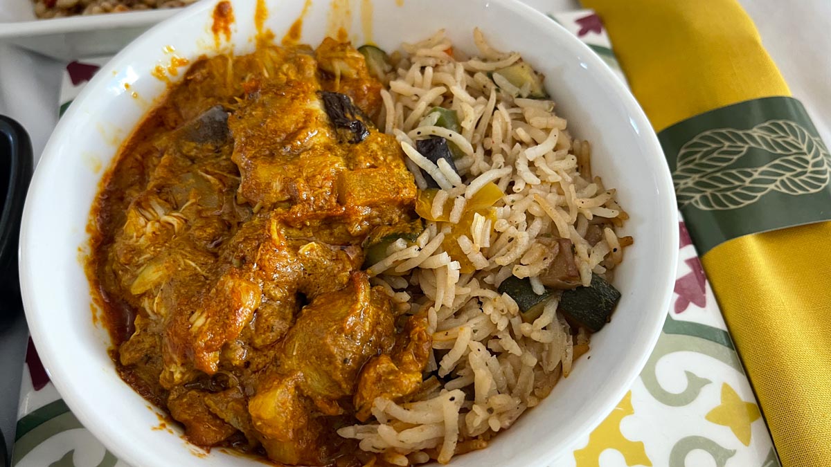 a bowl of rice and meat