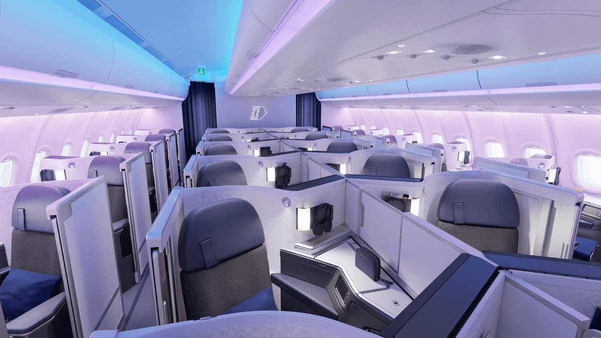 a cabin of an airplane with rows of seats