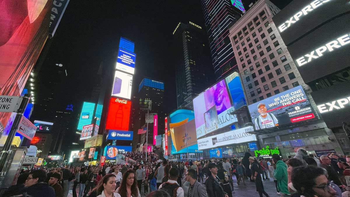 a crowd of people in Times Square