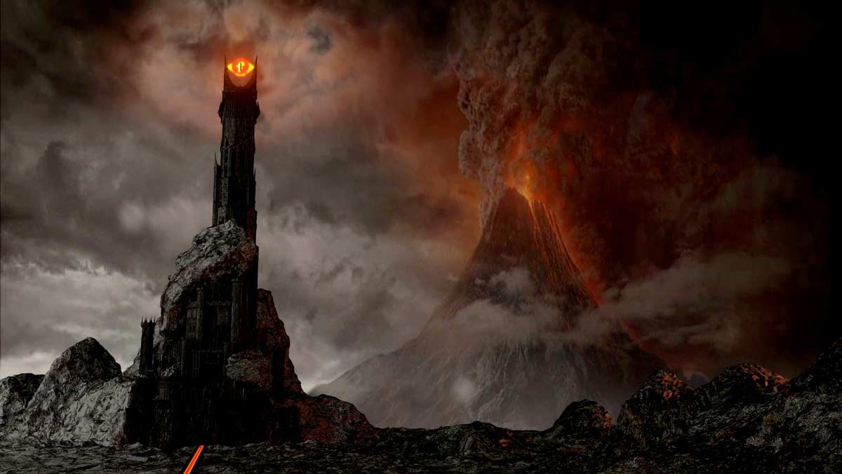 a tower with a fire in the background