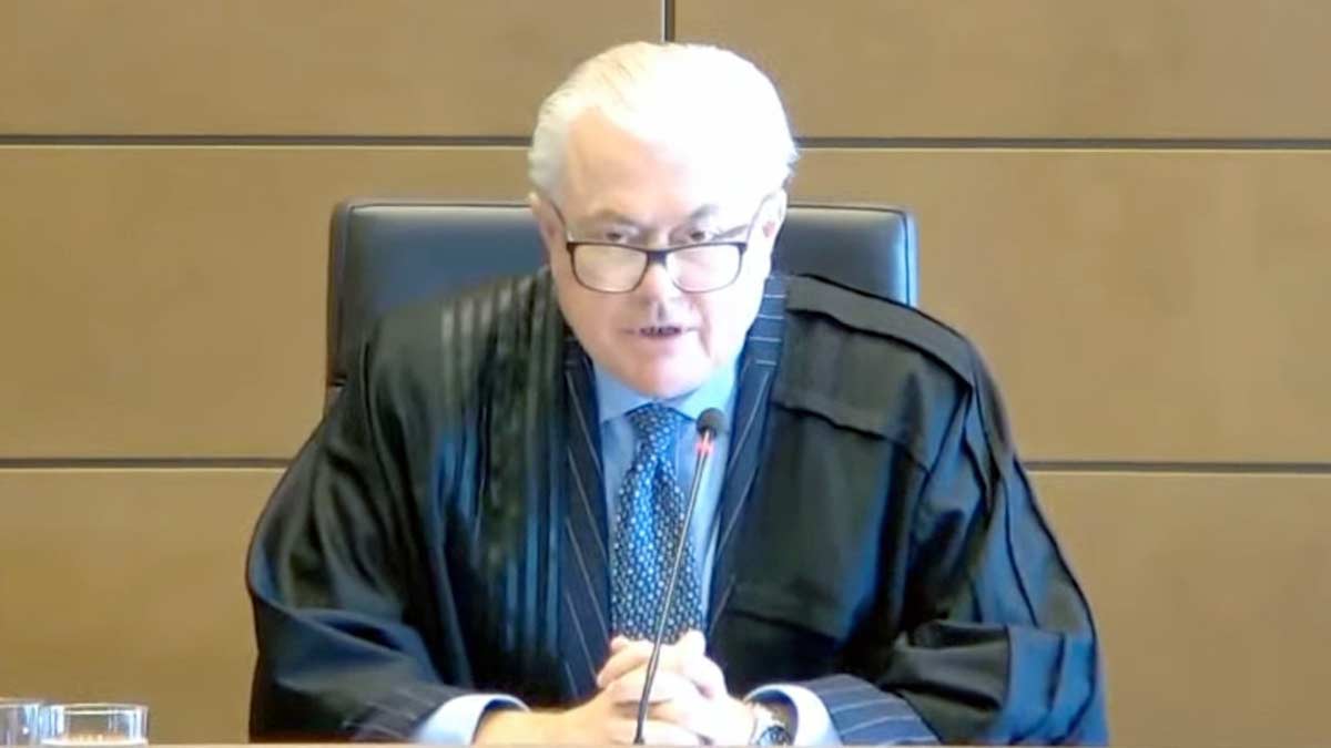 a man in a black robe