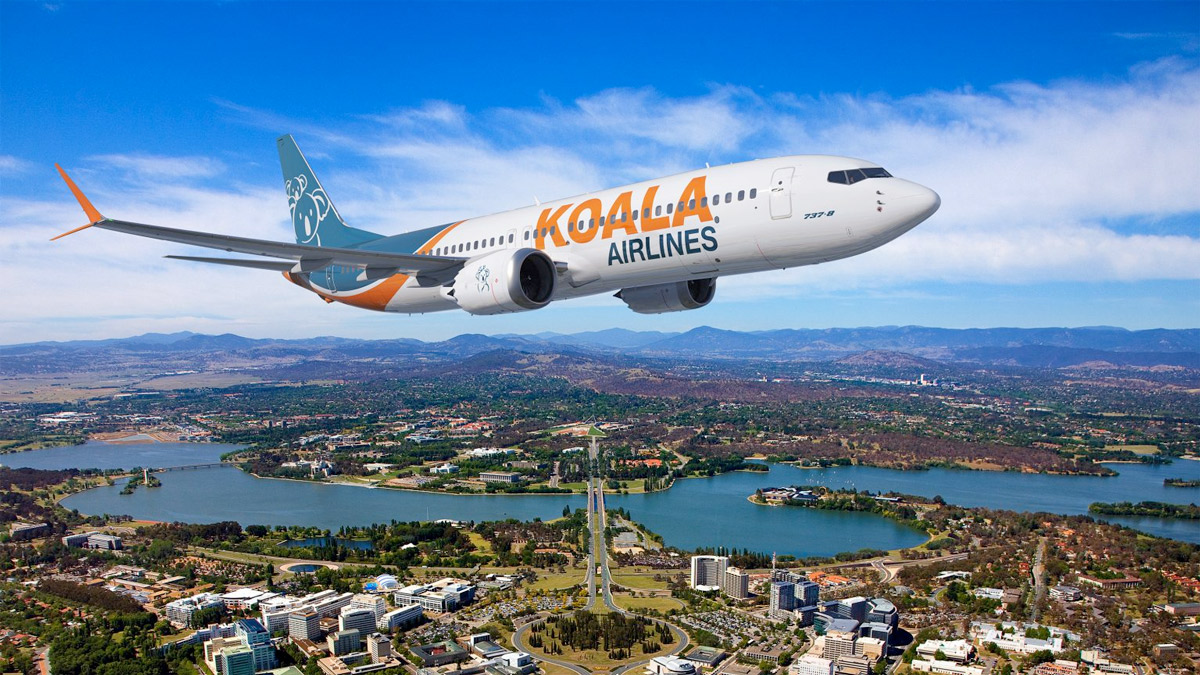 an airplane flying over a city