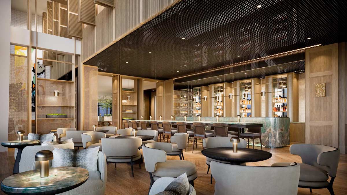a room with a bar and chairs