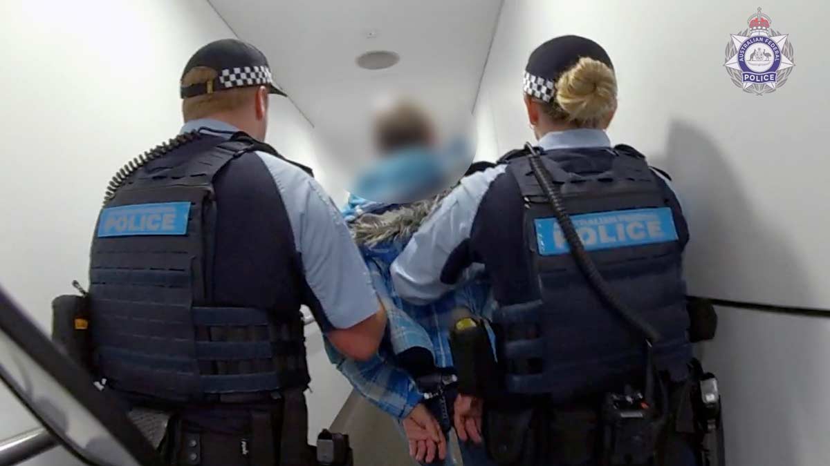 a group of police officers in a hallway