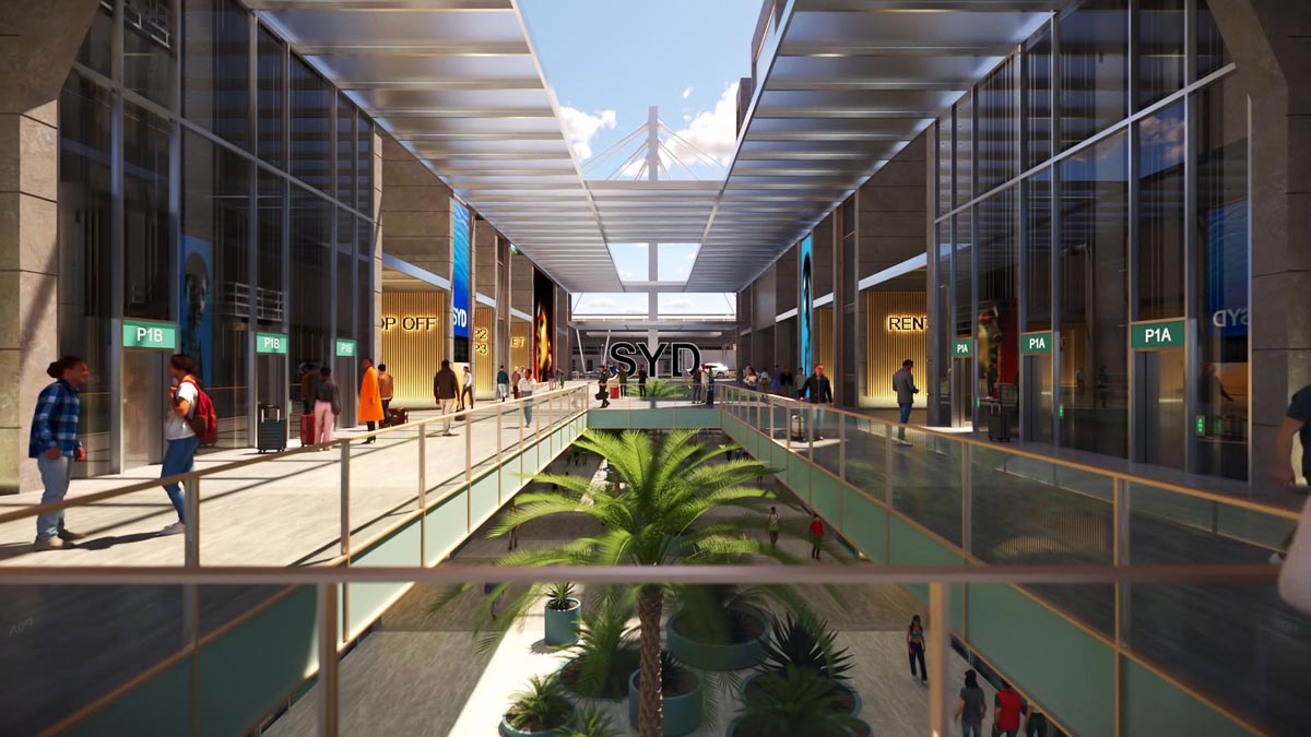 a large shopping mall with glass walls and a glass walkway